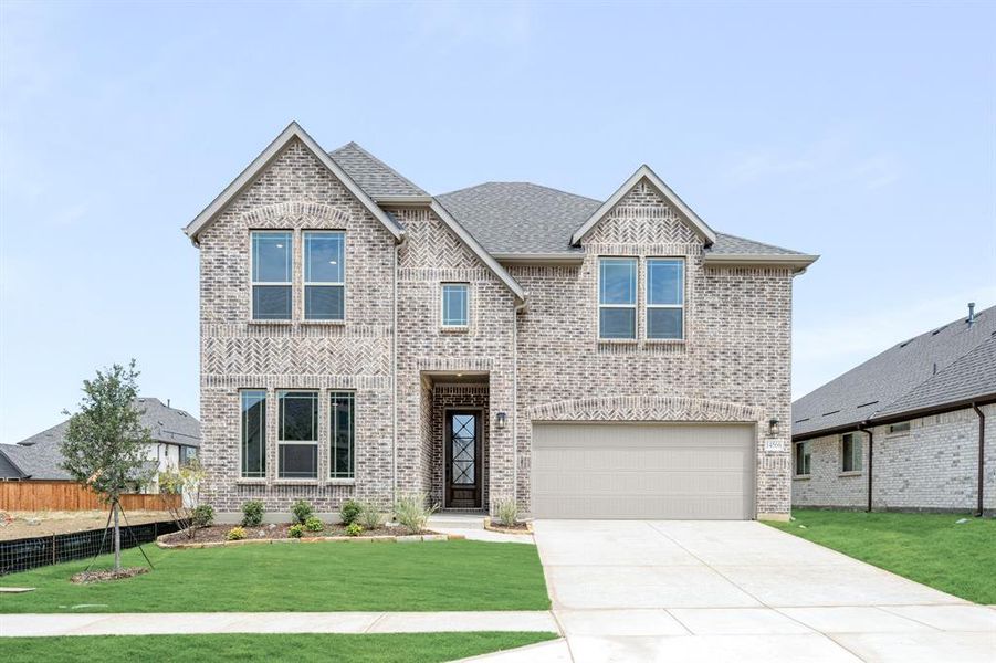 Front exterior of a new home in Creekview Meadows, Pilot Point, TX, highlighting curb appeal (Image 1). Front exterior of a new home in Creekview Meadows, Pilot Point, TX, highlighting curb appeal (Image 1).