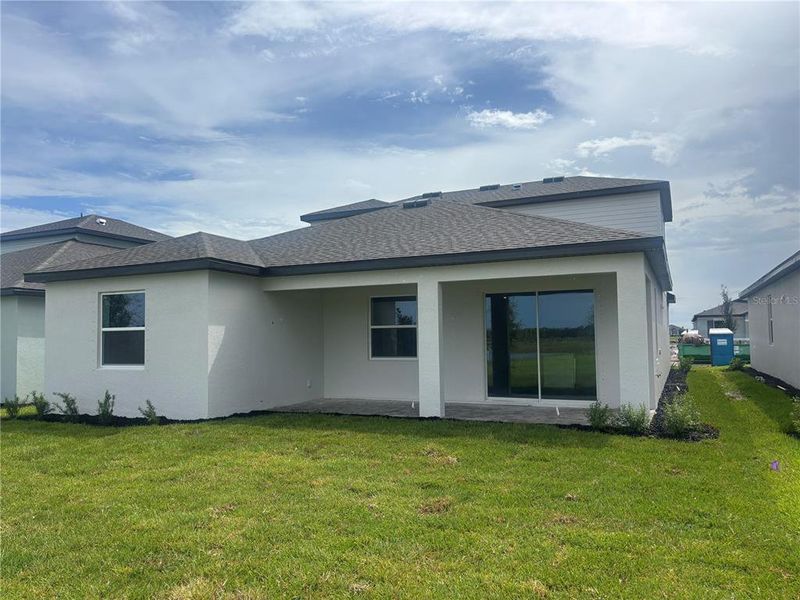 Exterior details and patio area of a home in Coasterra, Palmetto (Image 3).