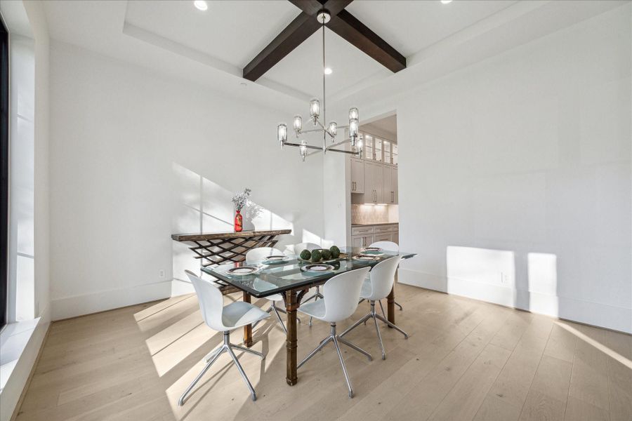 Formal Dining with wood beams at ceiling and Ralph Lauren chandelier Formal Dining with wood beams at ceiling and Ralph Lauren chandelier