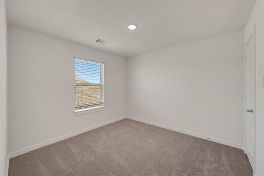 Spacious, unfurnished interior of a new home in Wildrye, Waller (Image 26).