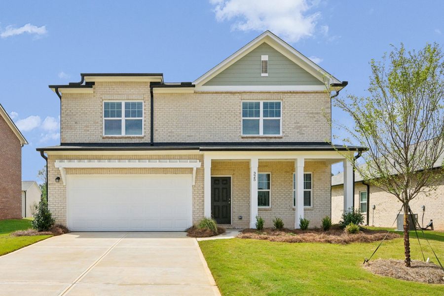 Representative exterior photo of a completed home built from the Beacon by Starlight Homes in Kendall Grove, McDonough, GA (Image 1).
