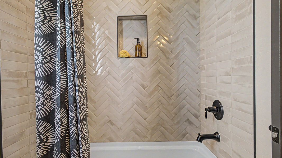 Secondary bathroom in this quick move-in new home by DRB Homes at Saguaro Hills at Vistancia, 32407 N 123rd Dr. Secondary bathroom in this quick move-in new home by DRB Homes at Saguaro Hills at Vistancia, 32407 N 123rd Dr.