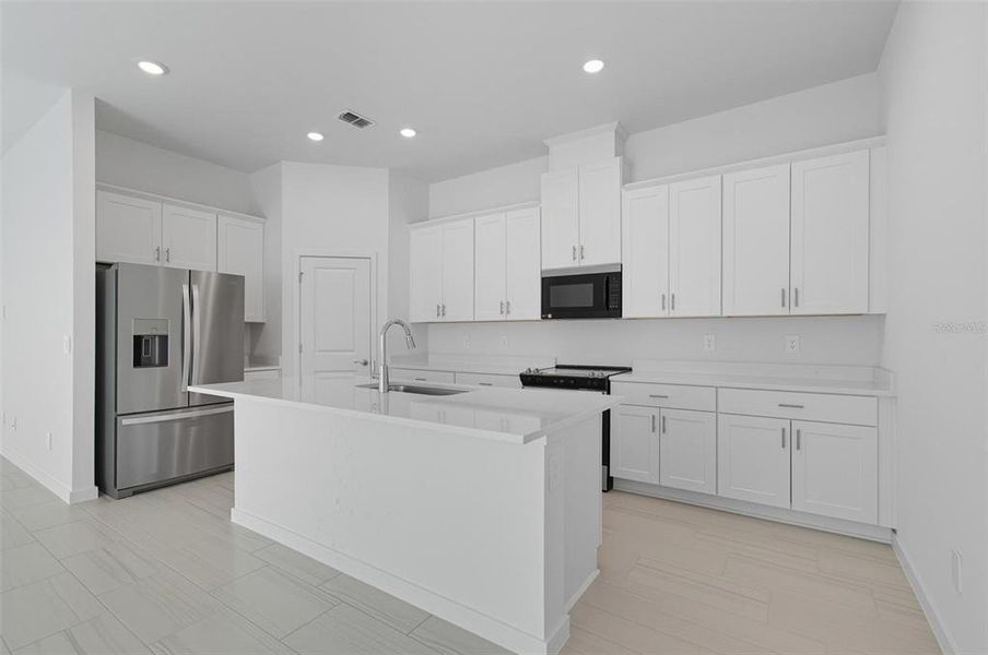 Furnished interior view inside a new home in , Palm Coast (Image 7). Furnished interior view inside a new home in , Palm Coast (Image 7).