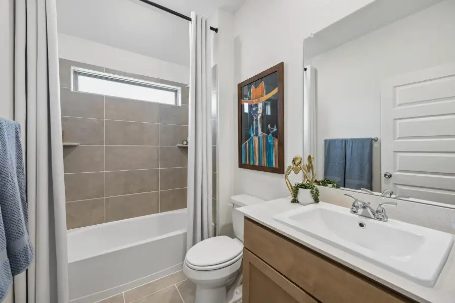 Bathroom in the Pecos home plan by Trophy Signature Homes – REPRESENTATIVE PHOTO