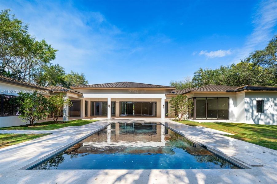 Exterior details and patio area of a home in , Pinecrest (Image 19). Exterior details and patio area of a home in , Pinecrest (Image 19).