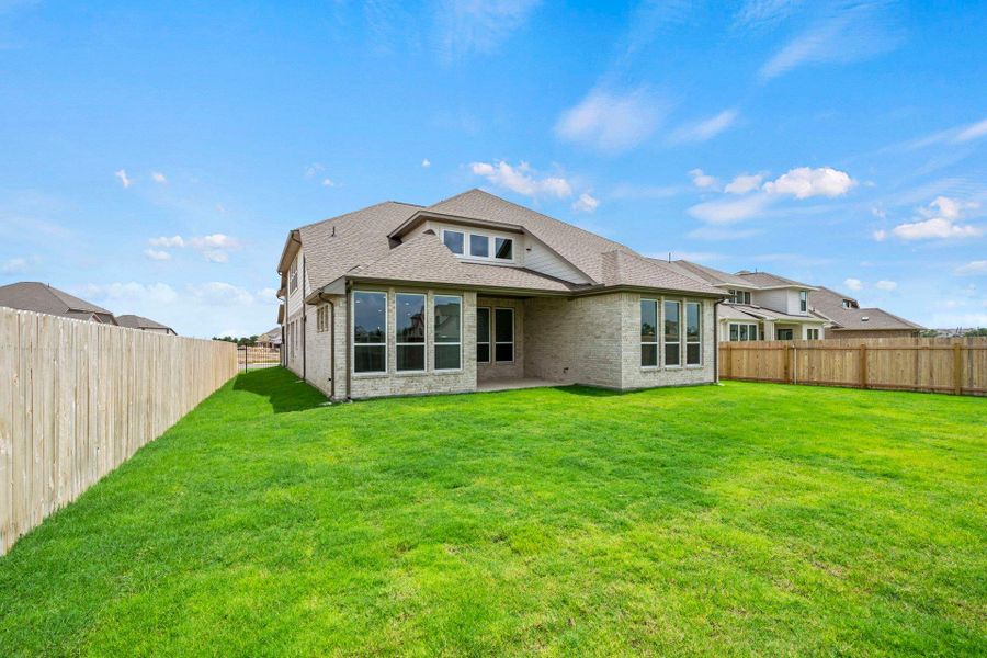 Rear of Home and Private Backyard