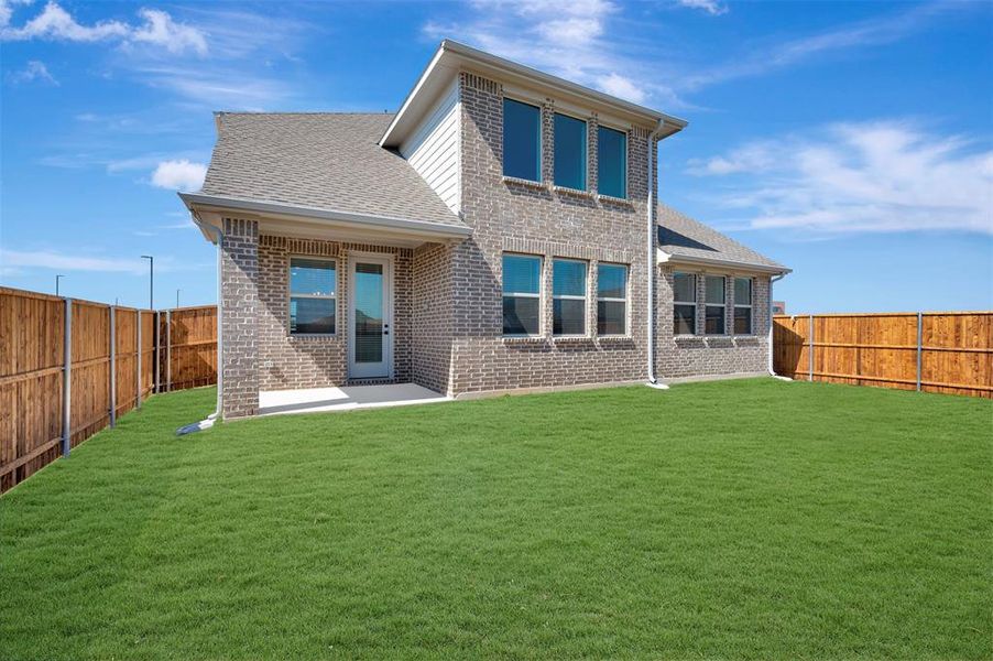 Exterior details and patio area of a home in Timberbrook, Justin (Image 21).