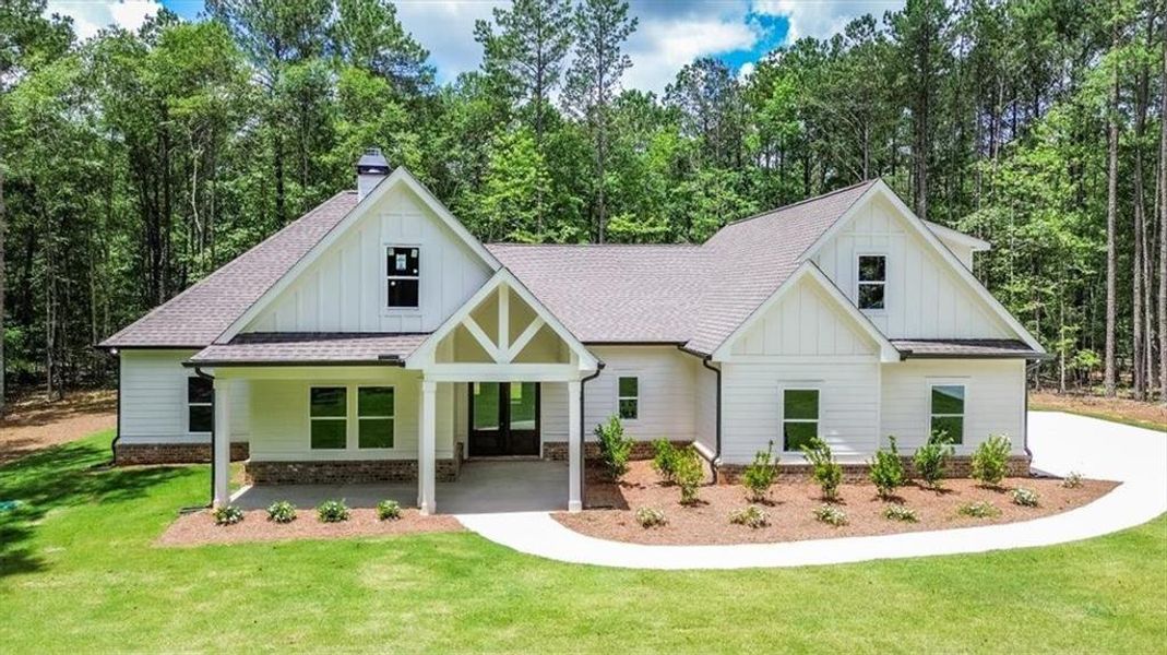 Front exterior of a new home in , Social Circle, GA, highlighting curb appeal (Image 29). Front exterior of a new home in , Social Circle, GA, highlighting curb appeal (Image 29).