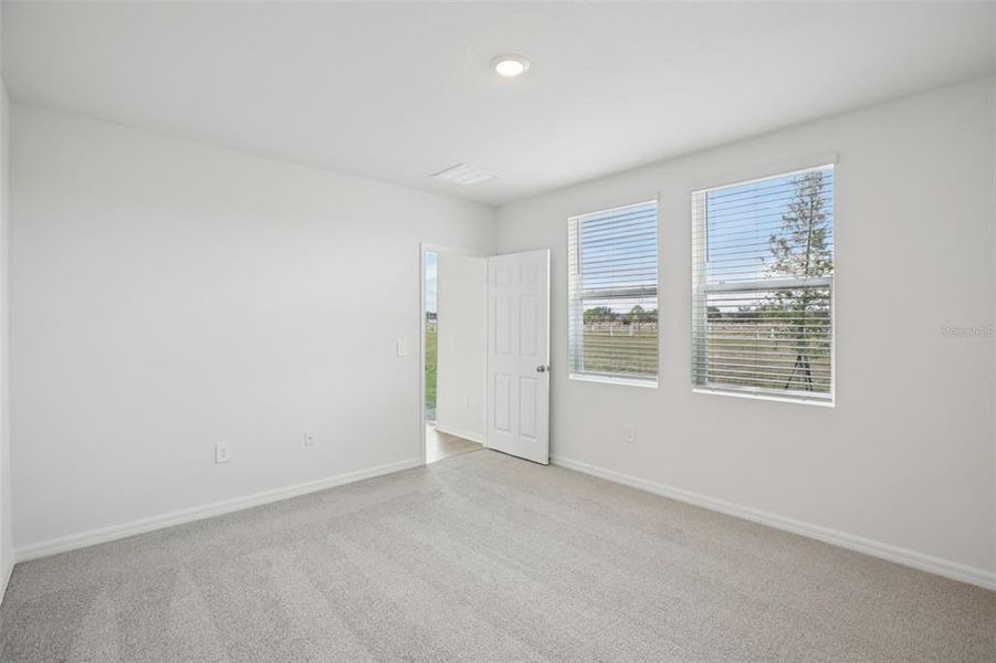 Spacious, unfurnished interior of a new home in Villamar - Classic Series, Winter Haven (Image 25).