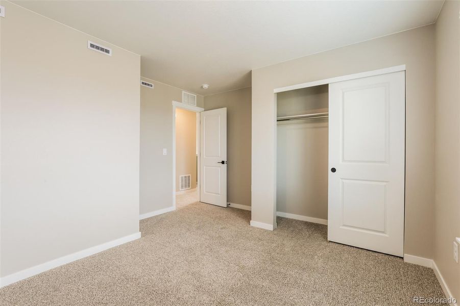 Spacious, unfurnished interior of a new home in Second Creek Farm, Commerce City (Image 15).