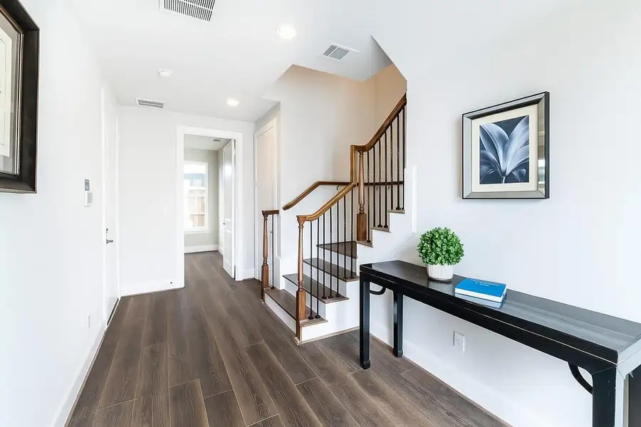 Grand entryway.   All wood floors throughout!