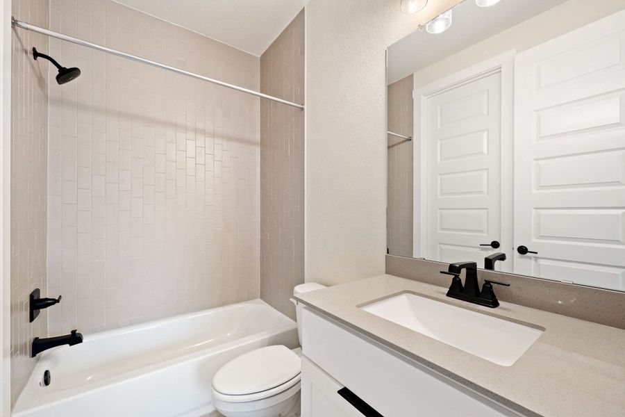 Furnished interior view inside a new home in Wolf Ranch, Georgetown (Image 18).