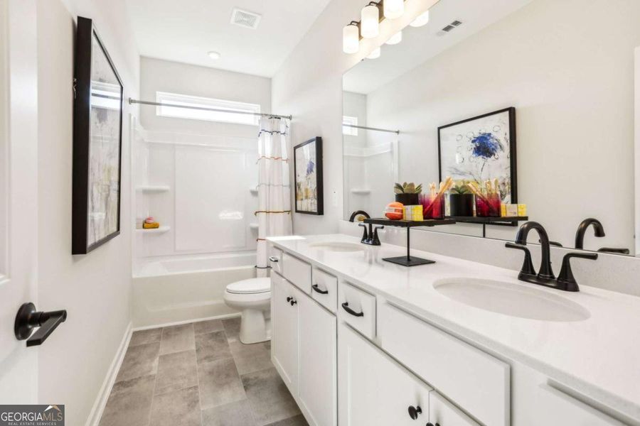 Furnished interior view inside a new home in Cobblestone Crossing Commons, Warner Robins (Image 25).