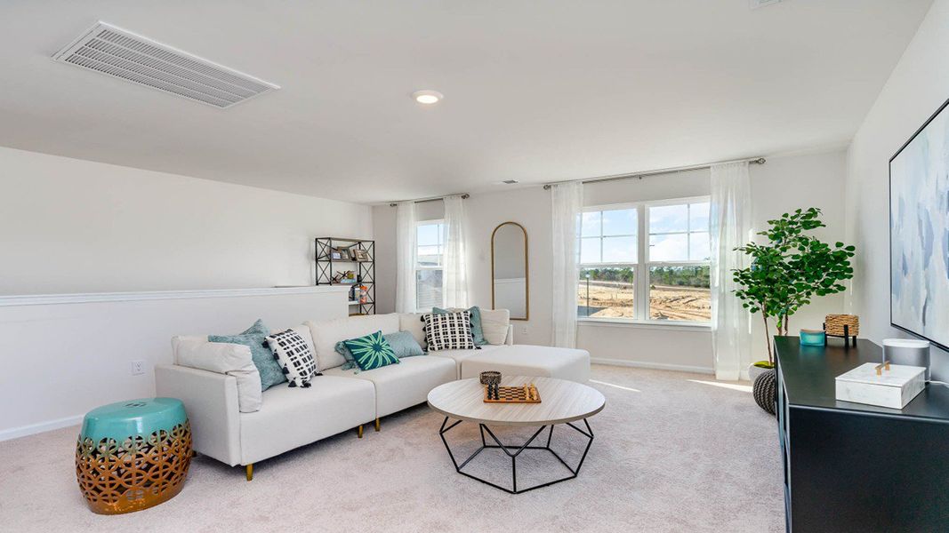 Furnished interior view inside a new home in Sandridge Park, Little River (Image 13).