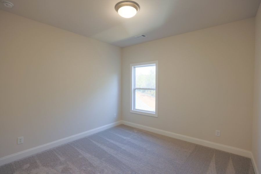 Representative unfurnished interior of a home built from the The Bennett by The Providence Group in Aberdeen, Hoschton (Image 38).