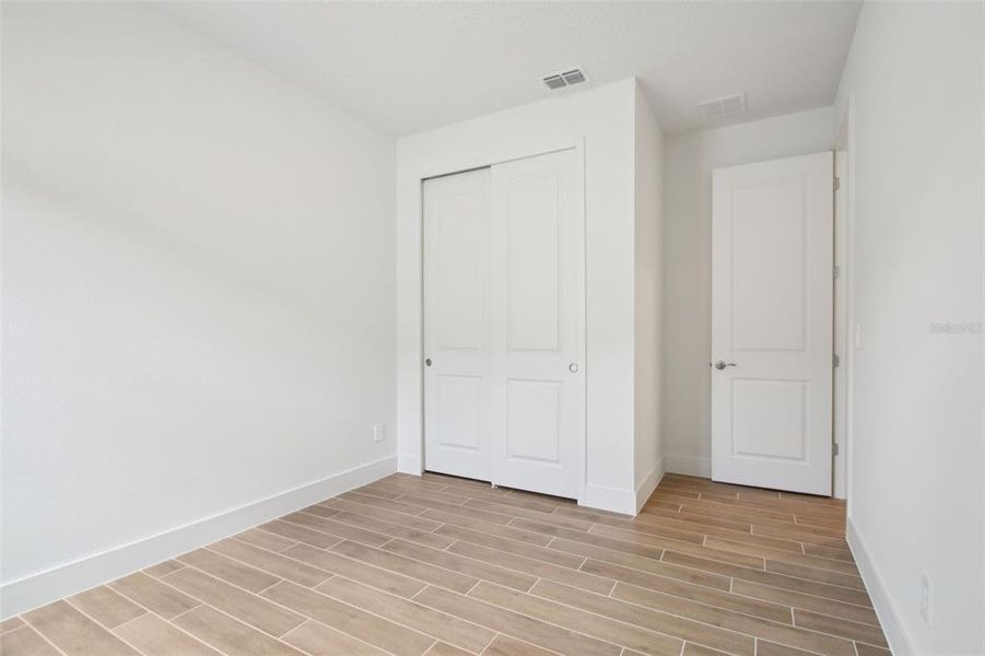 Spacious, unfurnished interior of a new home in Ridgehaven - Reserve Series, Ormond Beach (Image 32).