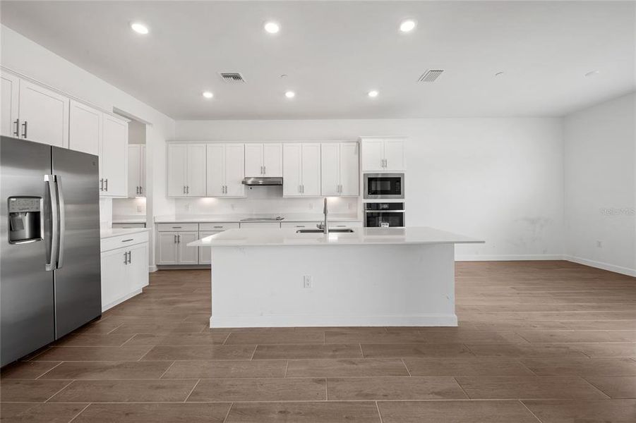 Furnished interior view inside a new home in Calusa Country Club, Lakewood Ranch (Image 12).