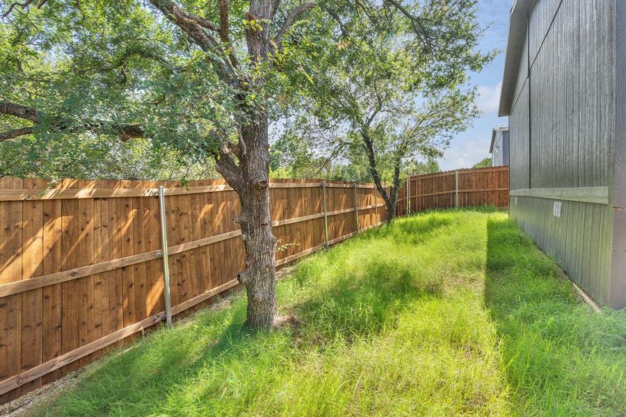 Exterior details and patio area of a home in , Granbury (Image 19).
