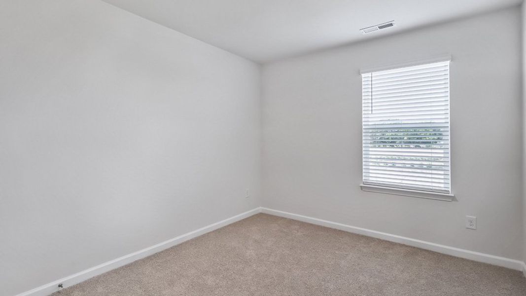 Representative unfurnished interior of a home built from the ALTAMONT by D.R. Horton in The Townes at Honeycutt Oaks, Angier (Image 21).