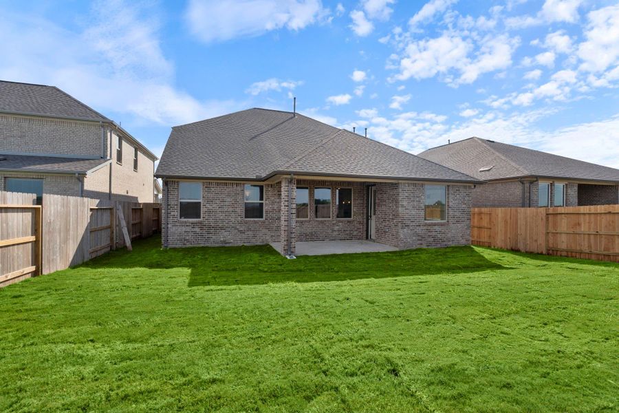 This backyard is perfect for family gatherings, social events, or simply unwinding in the fresh air. This backyard is perfect for family gatherings, social events, or simply unwinding in the fresh air.