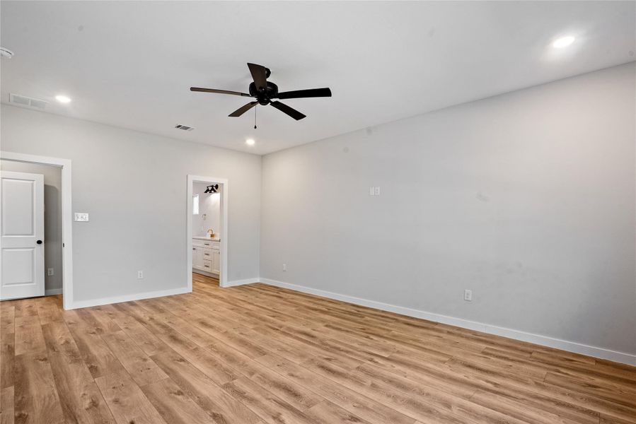 Unfurnished room with recessed lighting, light wood-style flooring, and ceiling fan