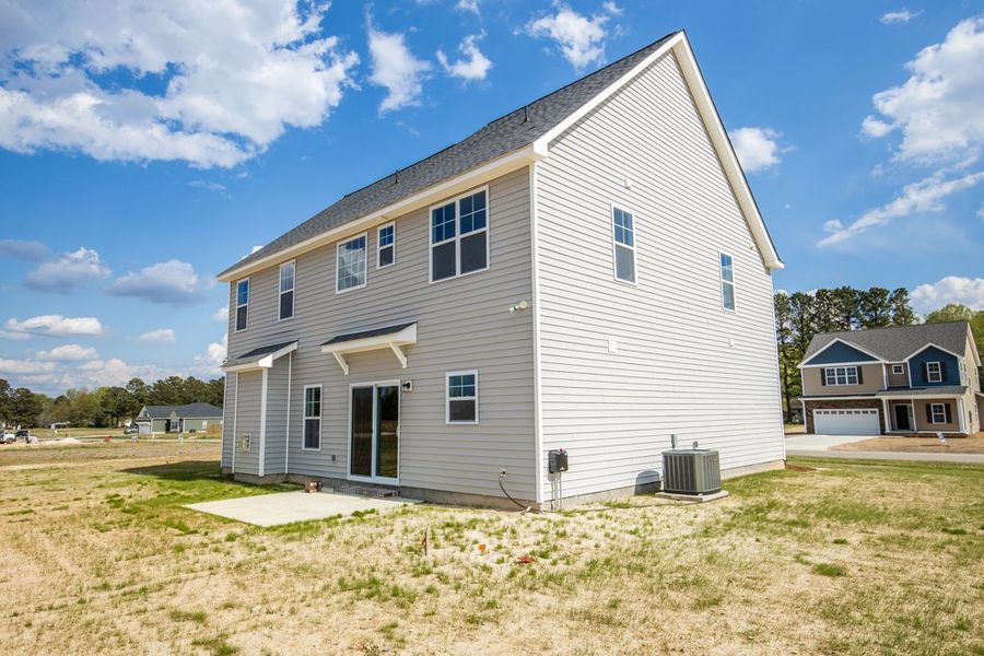Representative exterior photo of a completed home built from the Ryder by Bill Clark Homes in Arbor Hills South II, Greenville, NC (Image 30). Representative exterior photo of a completed home built from the Ryder by Bill Clark Homes in Arbor Hills South II, Greenville, NC (Image 30).
