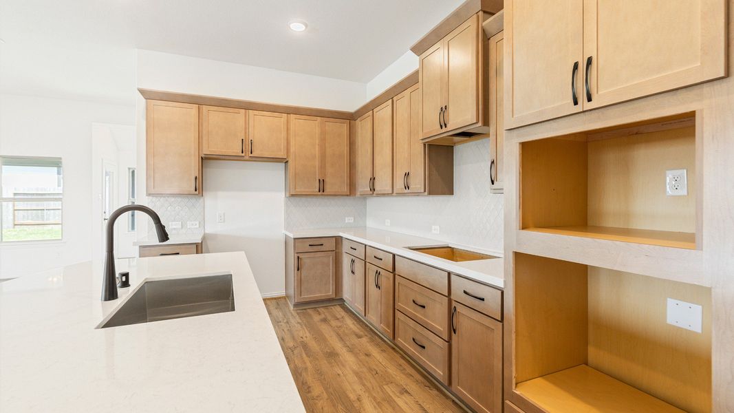Furnished interior view inside a new home in Sunterra, Katy (Image 22).