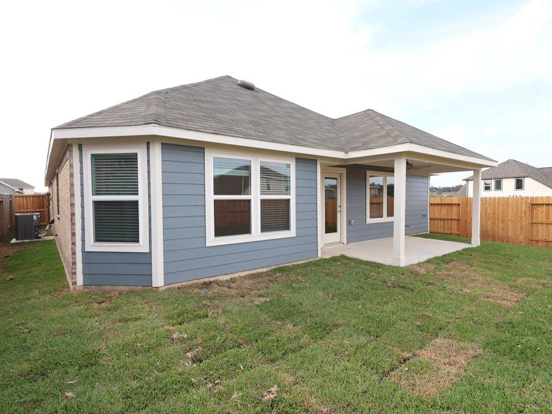 Exterior details and patio area of a home in Magnolia Ridge, Magnolia (Image 17). Exterior details and patio area of a home in Magnolia Ridge, Magnolia (Image 17).