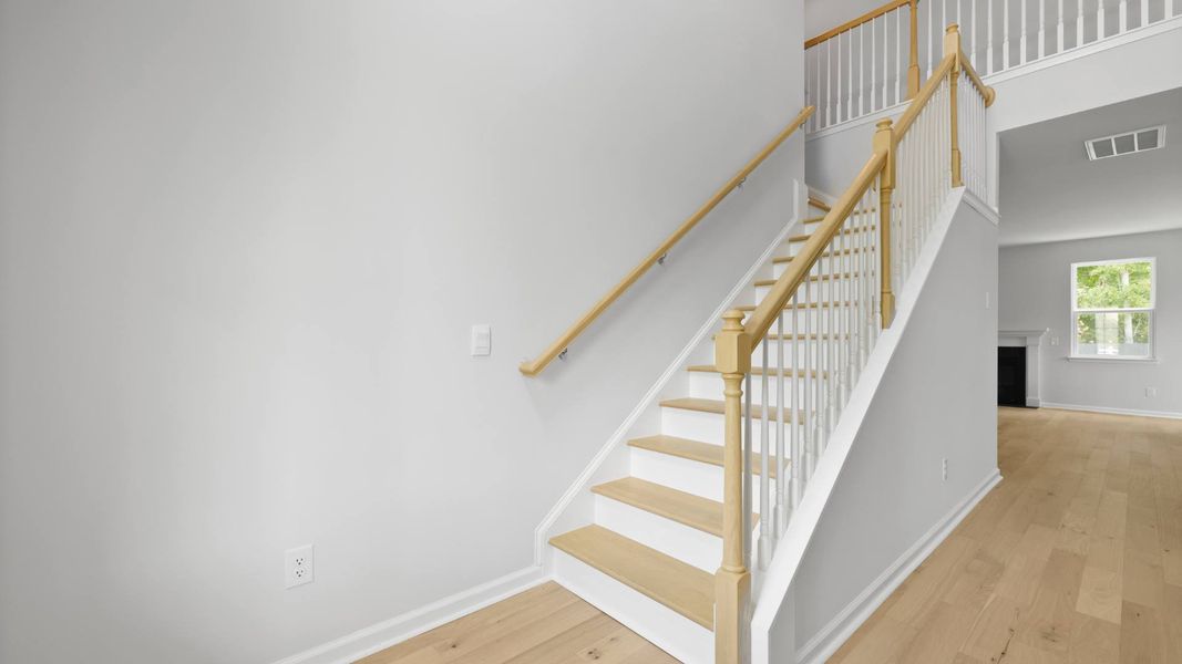 Representative unfurnished interior of a home built from the FORRESTER by D.R. Horton in Founders Corner, Summerville (Image 14).