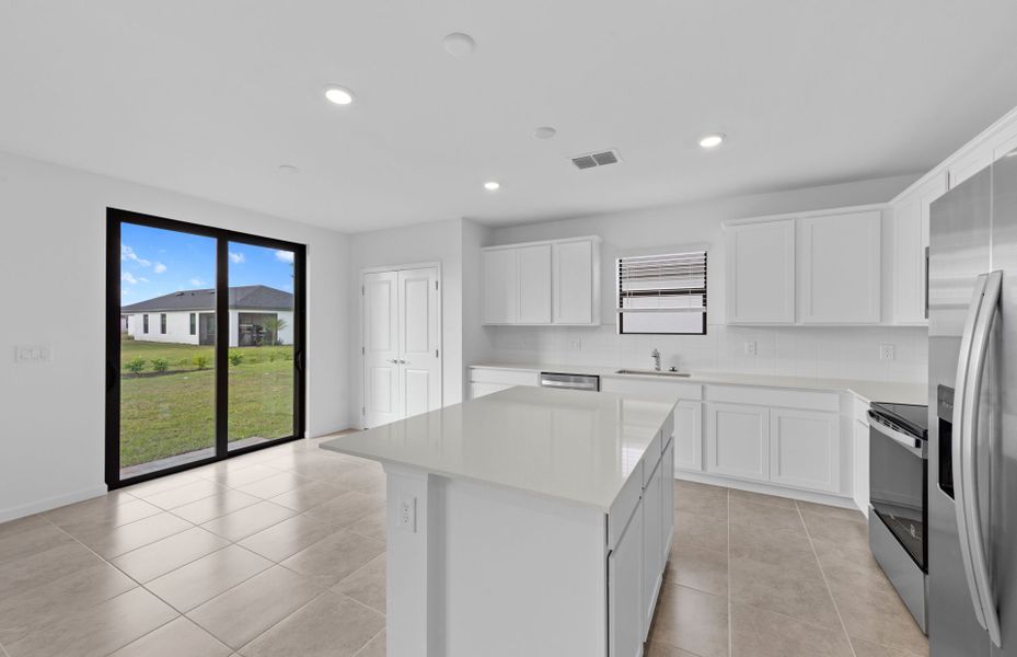 Furnished interior view inside a new home in Caloosa Cove, Labelle (Image 7).