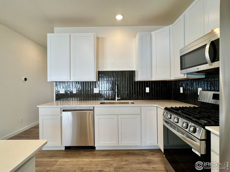 Furnished interior view inside a new home in Union Colony West, Greeley (Image 12).