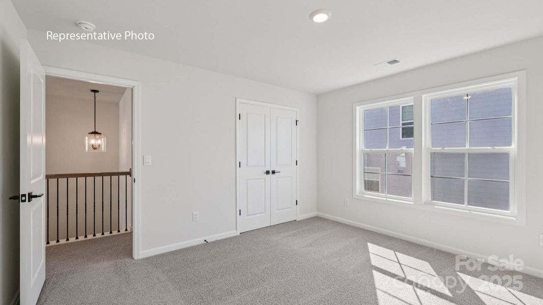 Spacious, unfurnished interior of a new home in Sanctuary at Southgate, Indian Trail (Image 24).