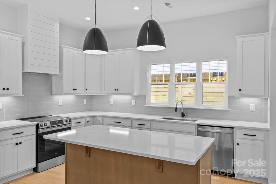 Furnished interior view inside a new home in , Charlotte (Image 5).