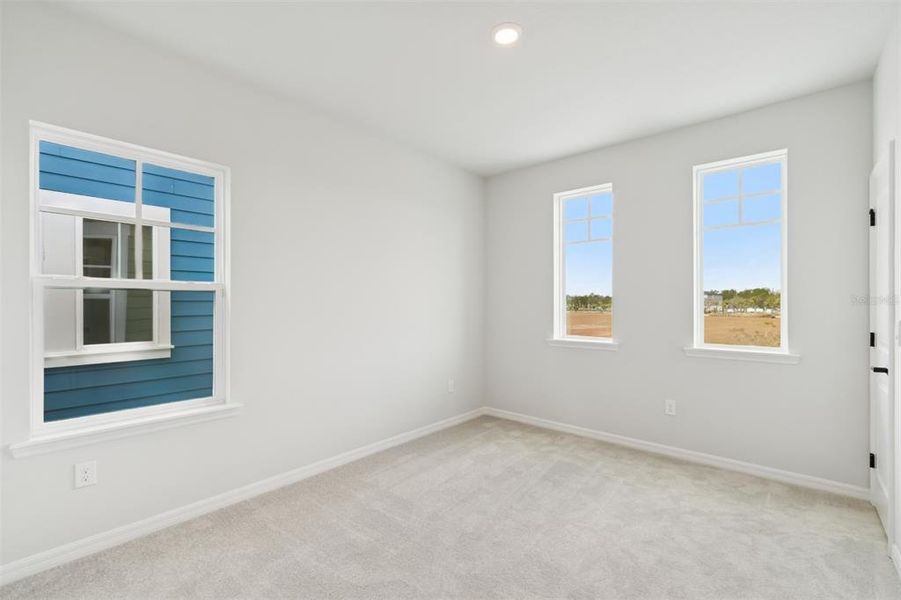 Spacious, unfurnished interior of a new home in Laureate Park at Lake Nona - Garden Series, Orlando (Image 36).