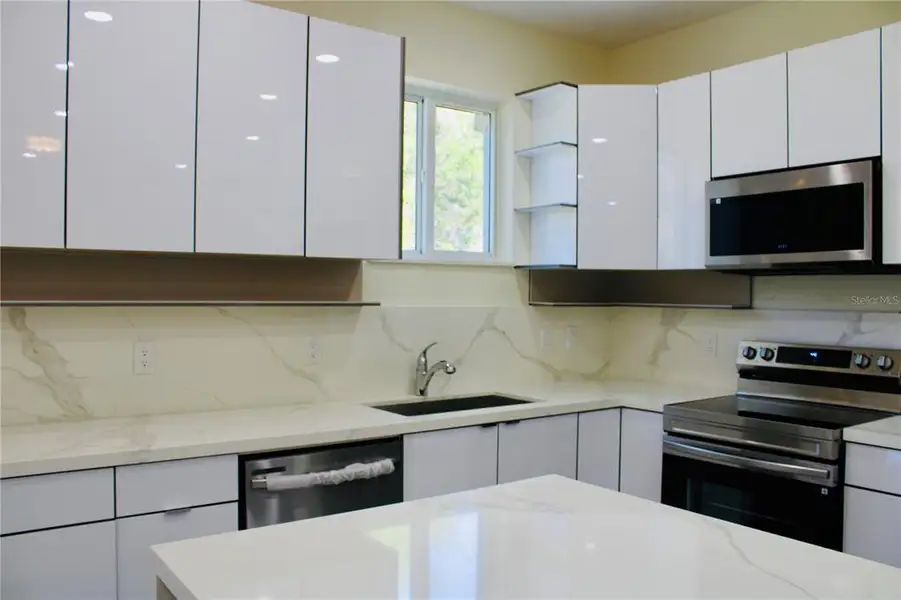 Furnished interior view inside a new home in , Port Charlotte (Image 7).