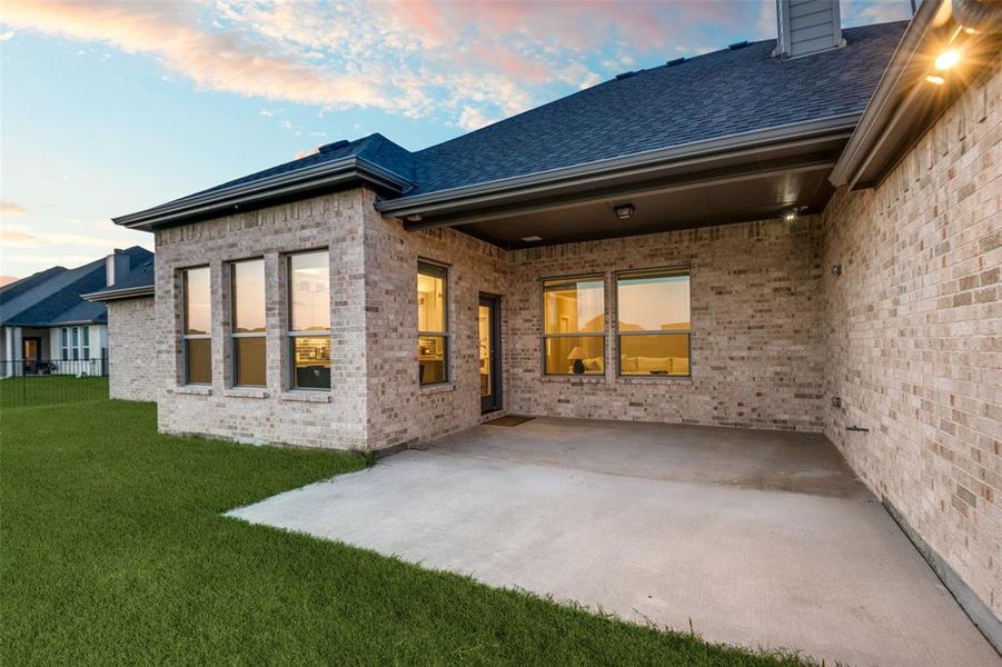 Front exterior of a new home in Lynx Hollow Estates, Forney, TX, highlighting curb appeal (Image 22).