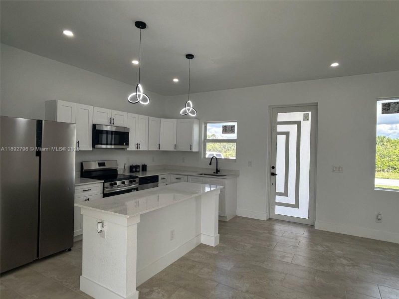 Furnished interior view inside a new home in , Lehigh Acres (Image 3). Furnished interior view inside a new home in , Lehigh Acres (Image 3).
