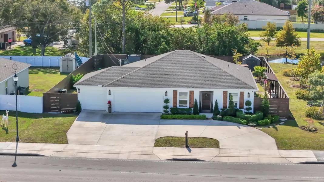 Front exterior of a new home in , Port St. Lucie, FL, highlighting curb appeal (Image 2). Front exterior of a new home in , Port St. Lucie, FL, highlighting curb appeal (Image 2).