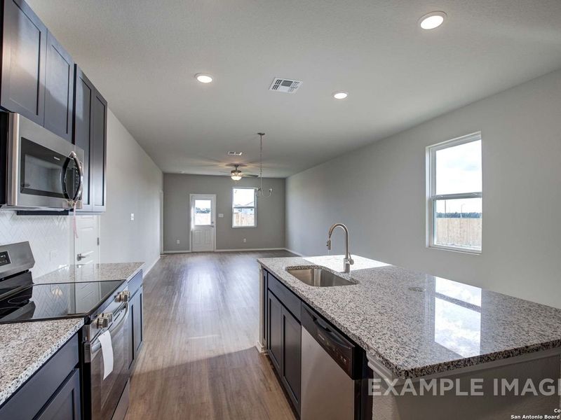 Furnished interior view inside a new home in Agave, San Antonio (Image 6).