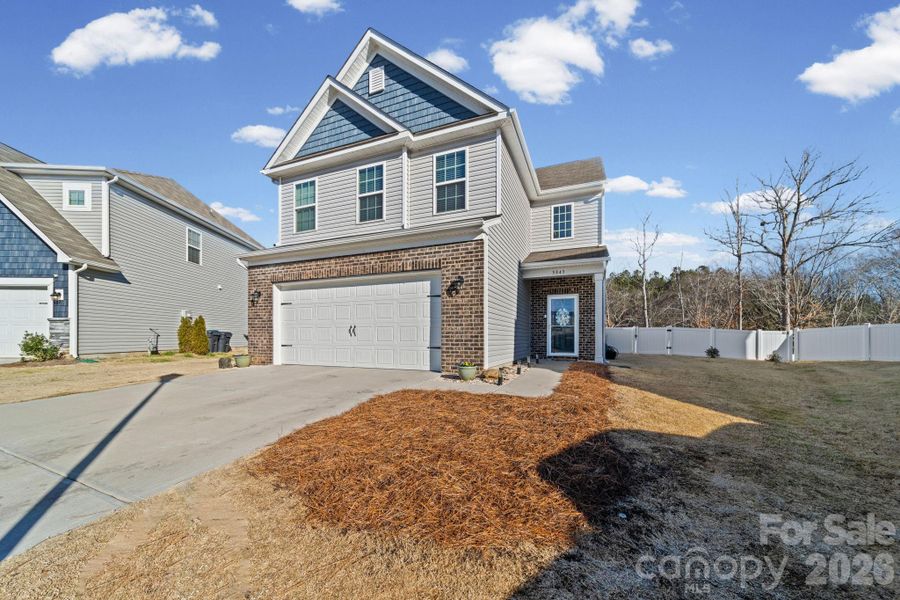 Front exterior of a new home in , Lancaster, SC, highlighting curb appeal (Image 22).