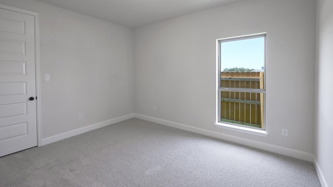 Spacious, unfurnished interior of a new home in 6 Creeks, Kyle (Image 25).