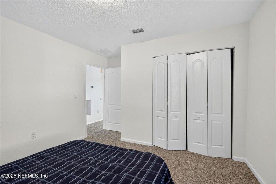 Spacious, unfurnished interior of a new home in River Glen Express, Yulee (Image 18).