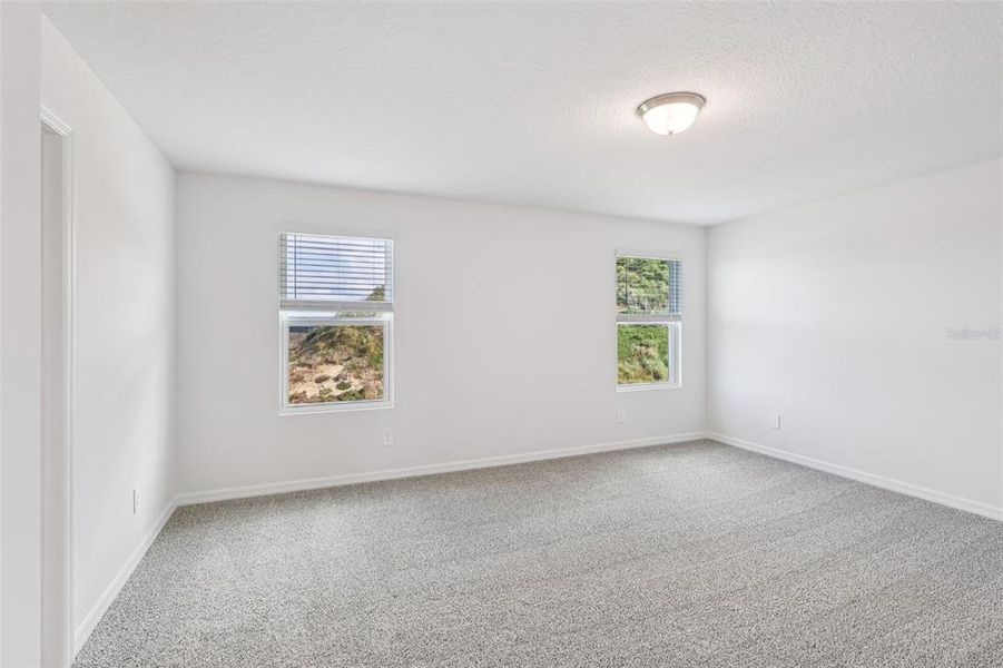 Spacious, unfurnished interior of a new home in Crosswinds - Signature Series, Haines City (Image 24).