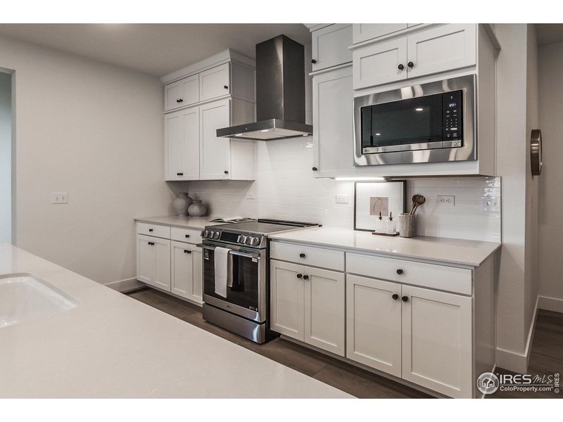 Furnished interior view inside a new home in Prairie Song Story Collection - Single Family Homes, Windsor (Image 8).