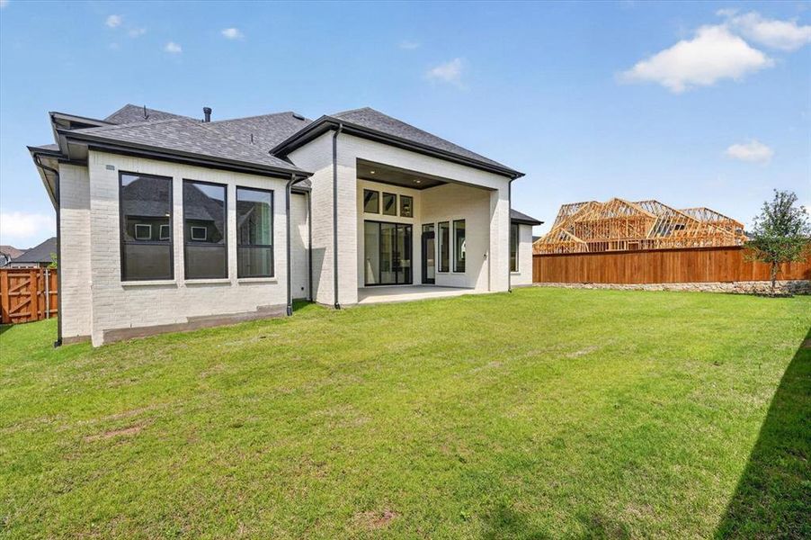 Exterior details and patio area of a home in Mustang Lakes, Celina (Image 2).