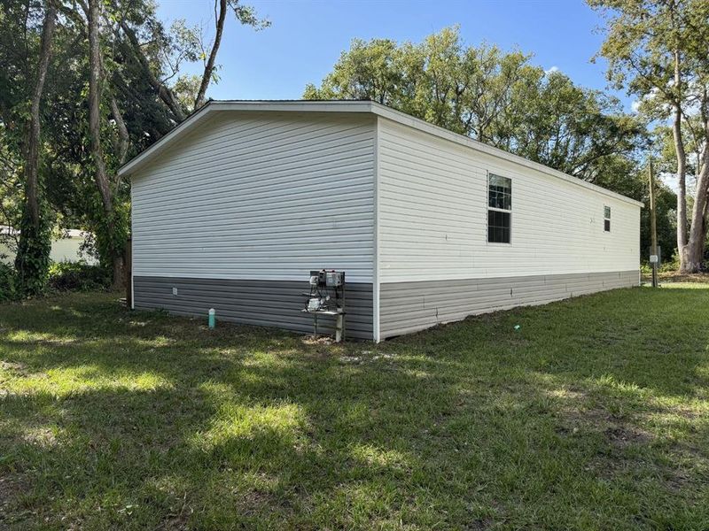 Exterior details and patio area of a home in , New Port Richey (Image 11).