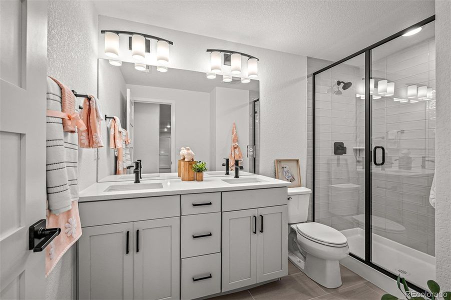 Furnished interior view inside a new home in Cloverleaf - Pinnacle Collection, Monument (Image 32).