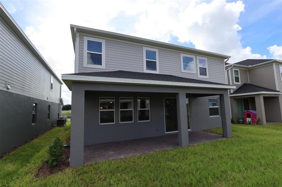 Exterior details and patio area of a home in Bay Lake Farms, St. Cloud (Image 31).