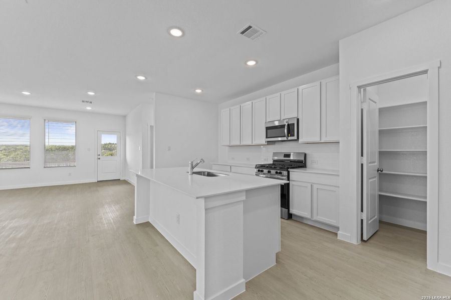 Furnished interior view inside a new home in Waterwheel, San Antonio (Image 8).