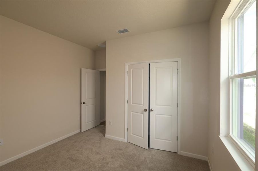 Spacious, unfurnished interior of a new home in Estates at Rivercrest, Sanford (Image 17).